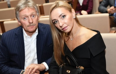 Песков и Навка поздравили россиян с наступающим Новым годом